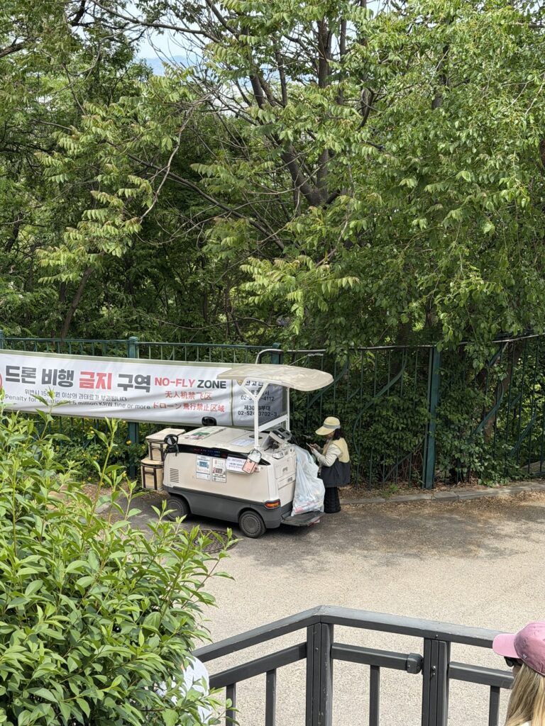 Yogurt vendor with motorized cart at Inwangsan trailhead — a classic Korean hiking tradition