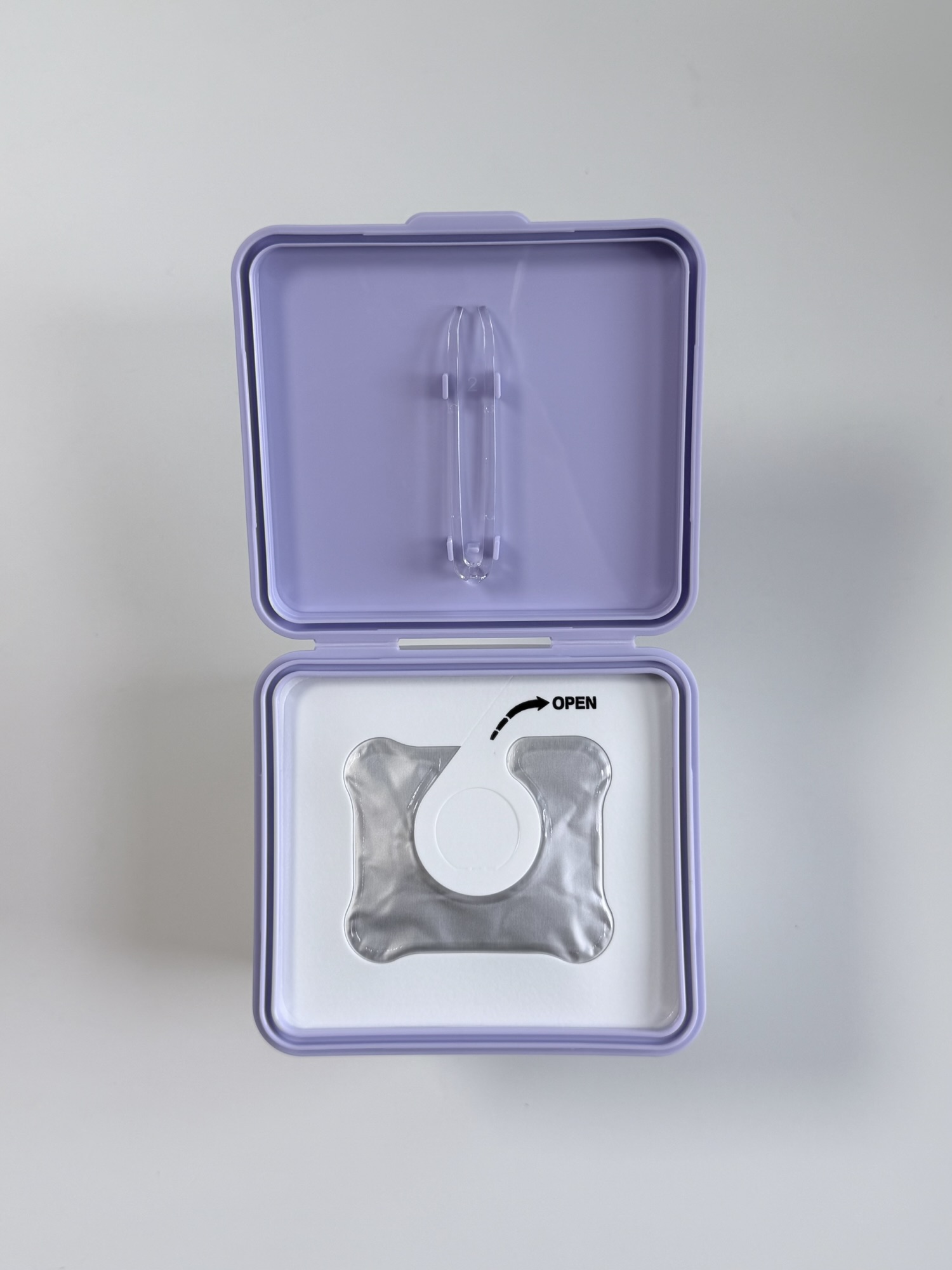 Sealed Rejuran toner pad container with built-in plastic tongs for hygienic pickup