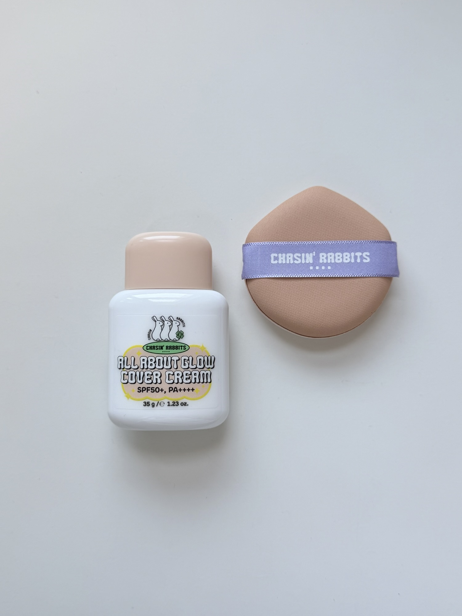 Chasing Rabbit All About Glow Cover Cream bottle and puff showing 35g size