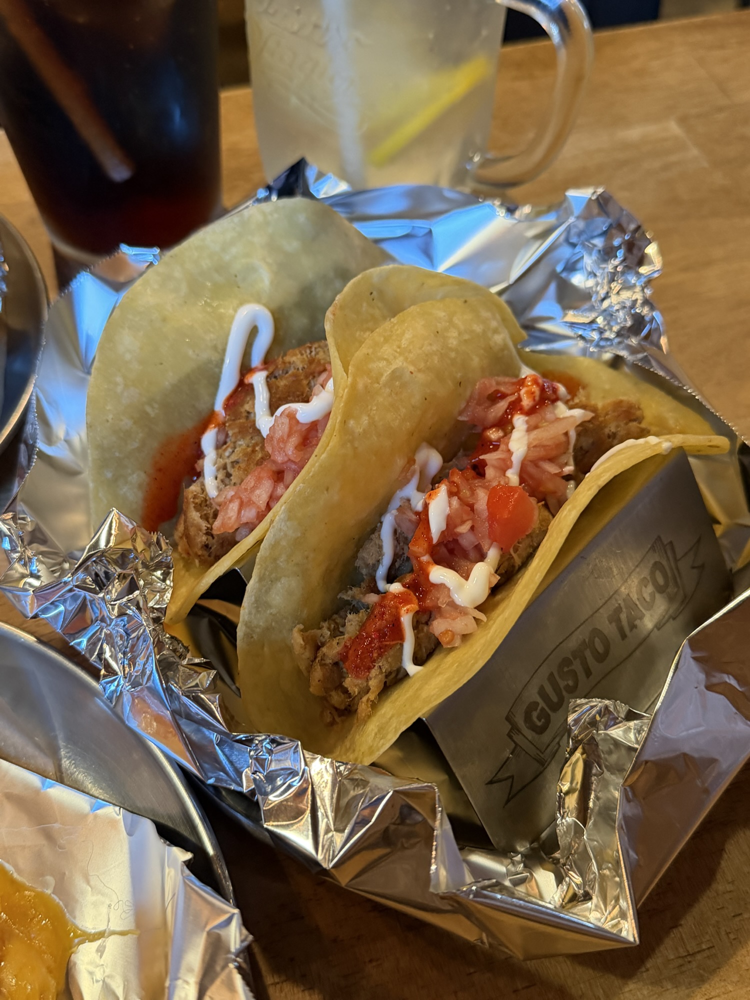 Pork tacos at Gusto Taco with pork, vegetables, and sauce