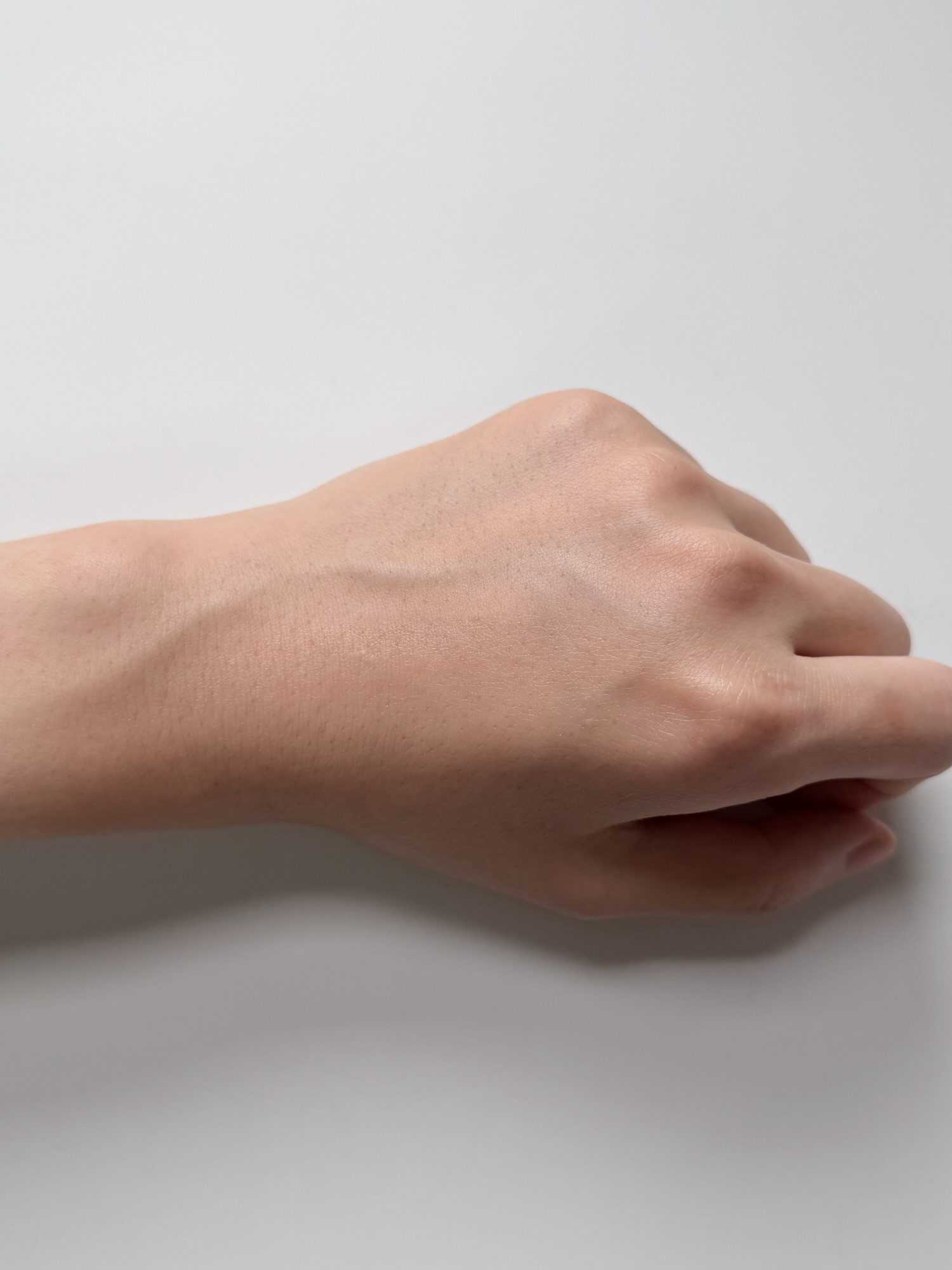 Back of hand after SOME BY MI Miracle Toner has absorbed with a clean non-sticky finish