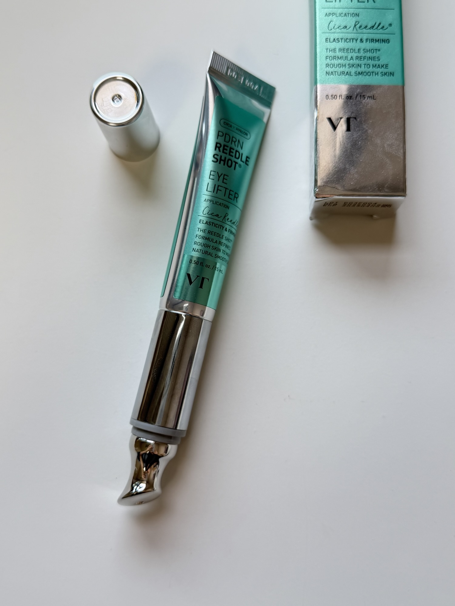 VT Eye Lifter tube with cap removed showing the metal applicator