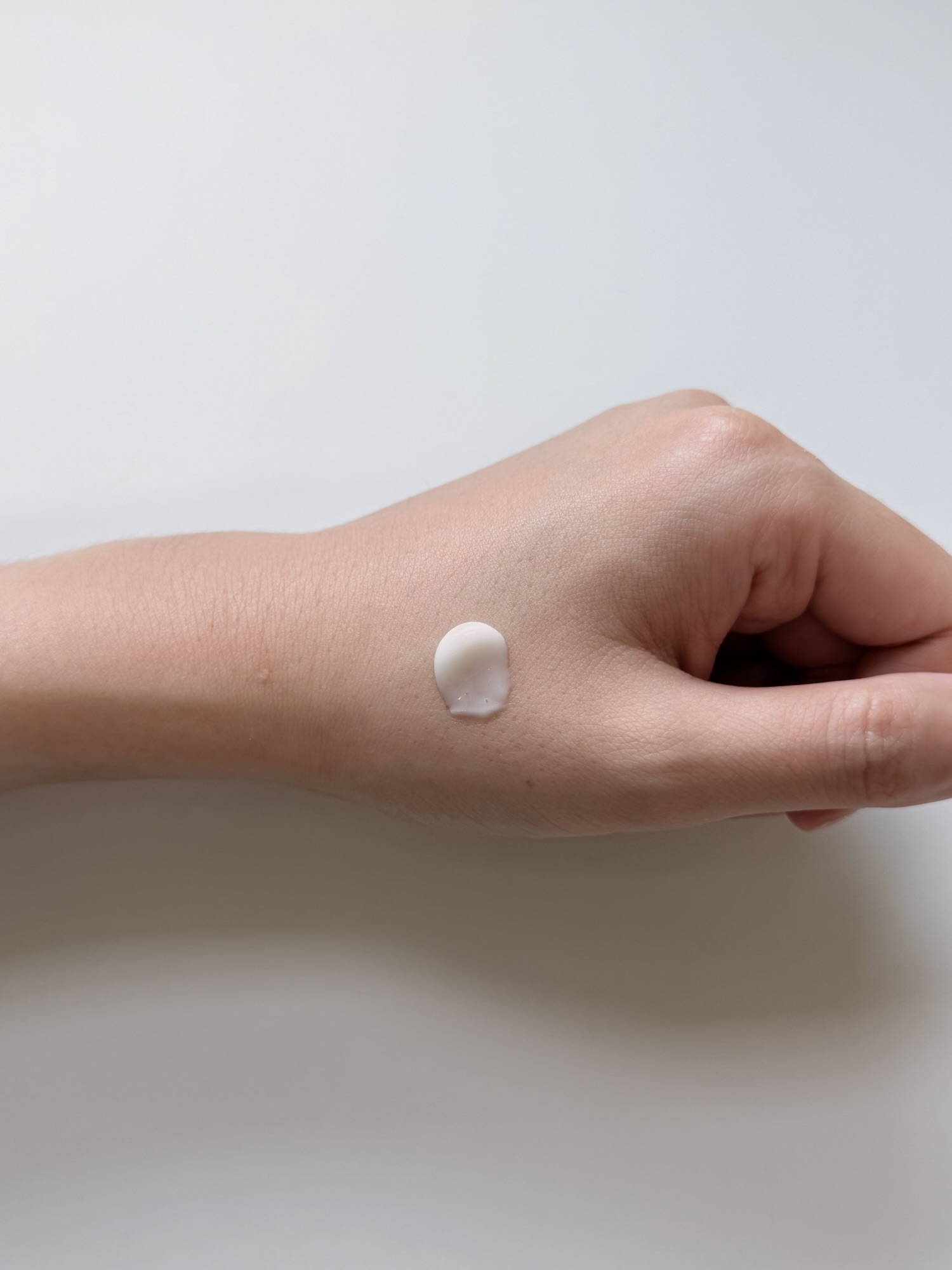 Dollop of rich VT Eye Lifter cream on the back of a hand