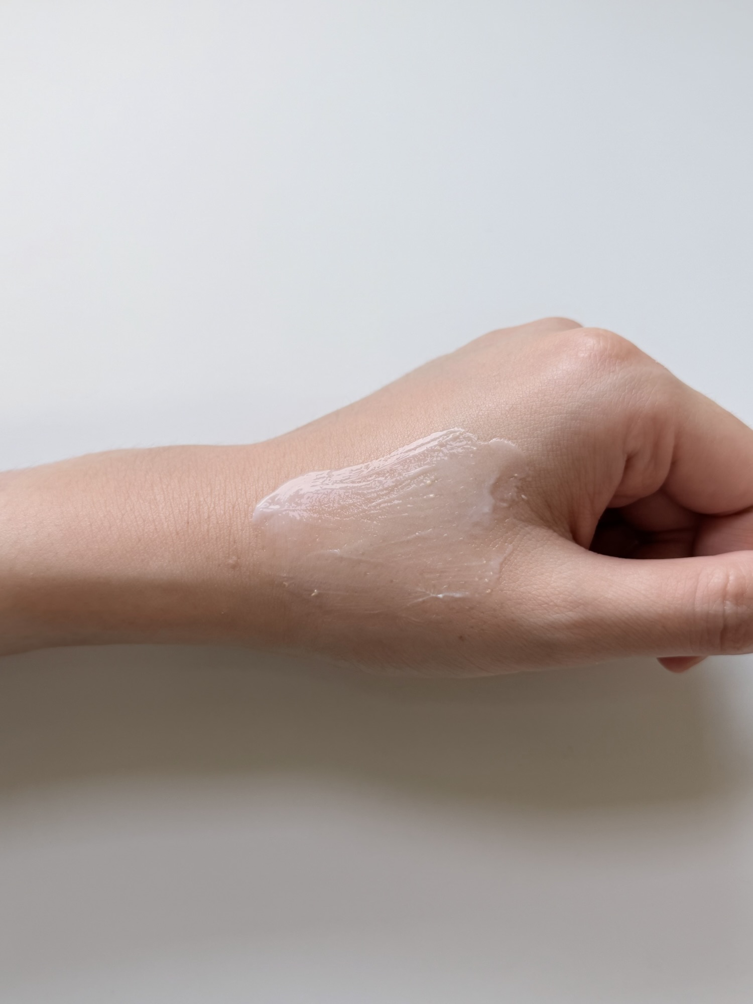 VT Eye Lifter cream spread across the back of a hand before fully absorbing