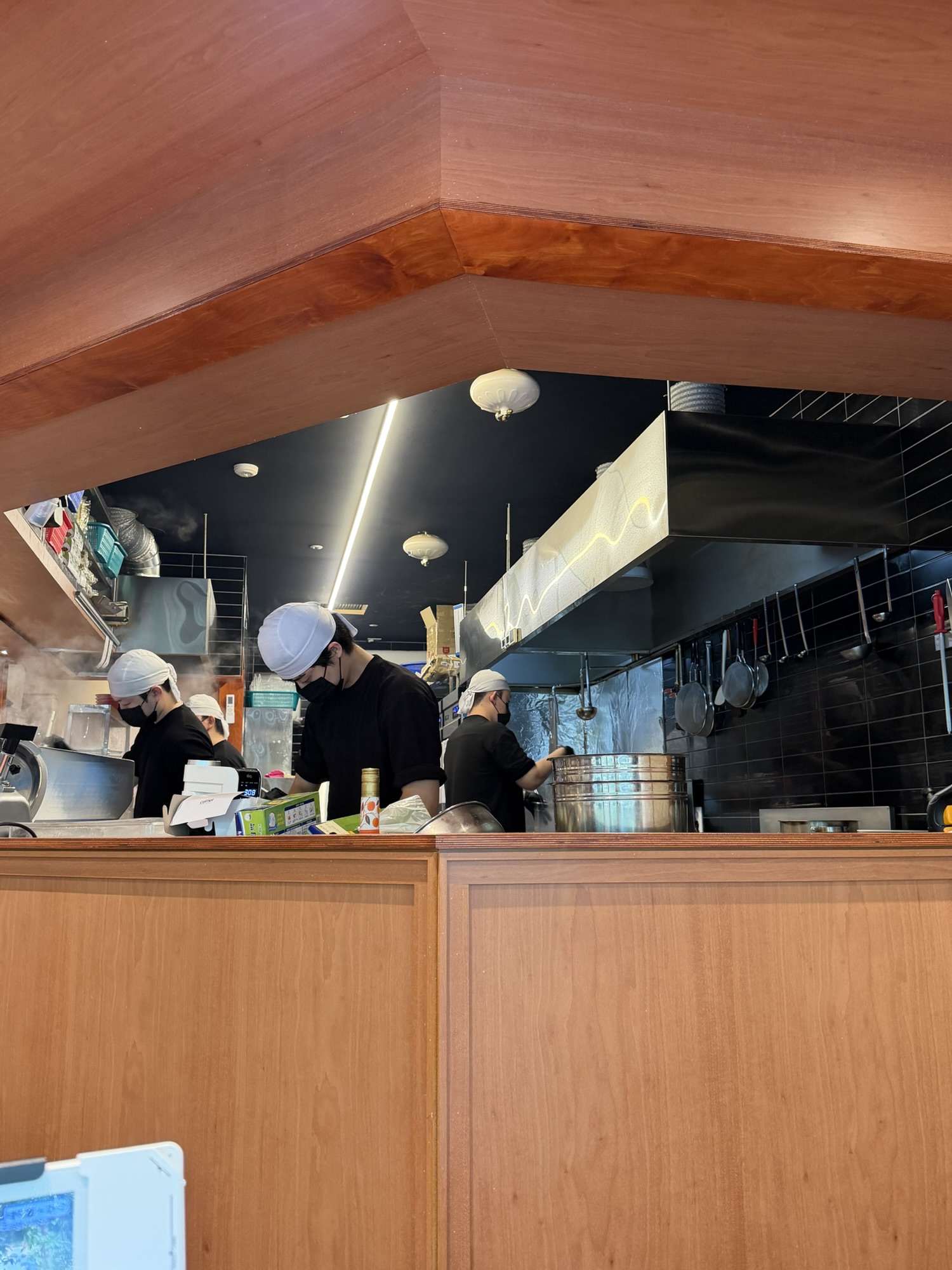 Open kitchen view from the bar seat at Menchuru Yeouido