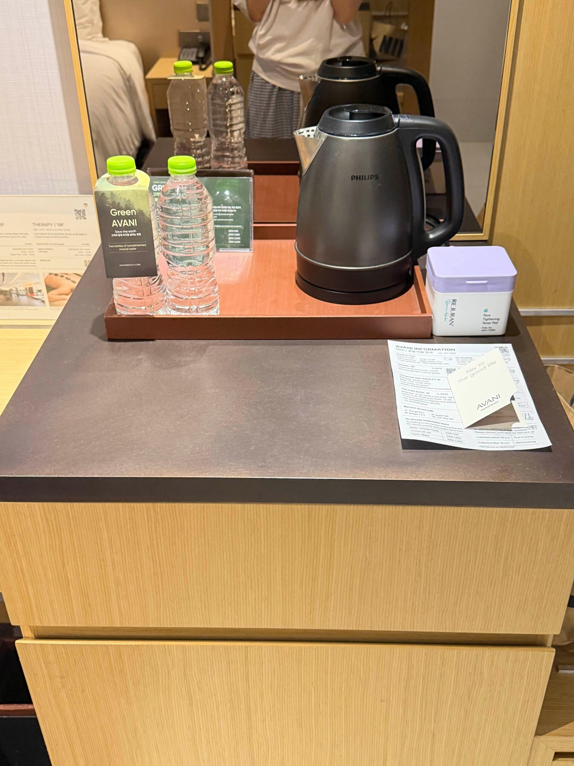 Mini fridge kettle and bottled water at Avani Central Busan