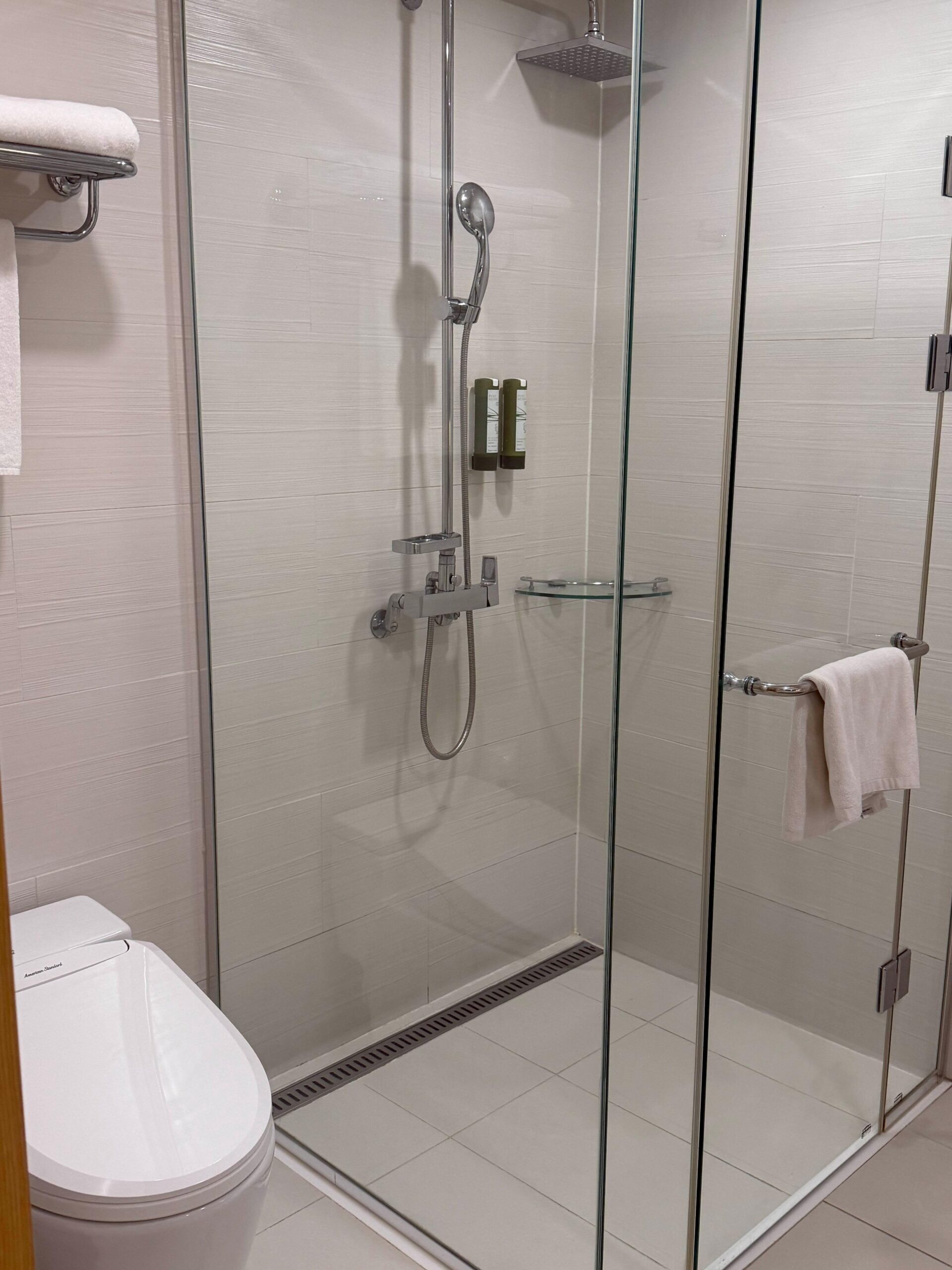 Bathroom shower and toilet at Avani Central Busan