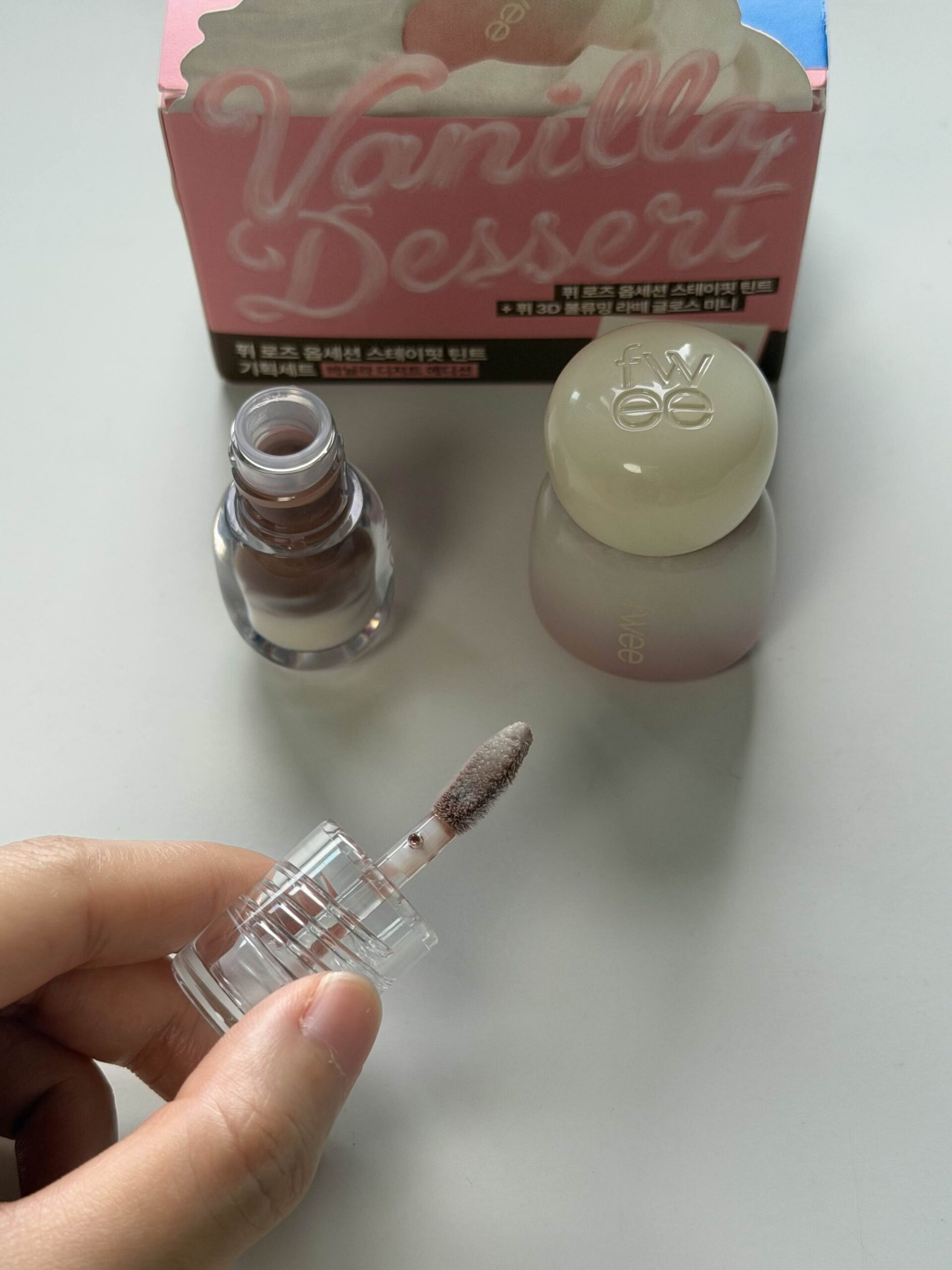 fwee Latte gloss close-up showing a soft beige gloss color