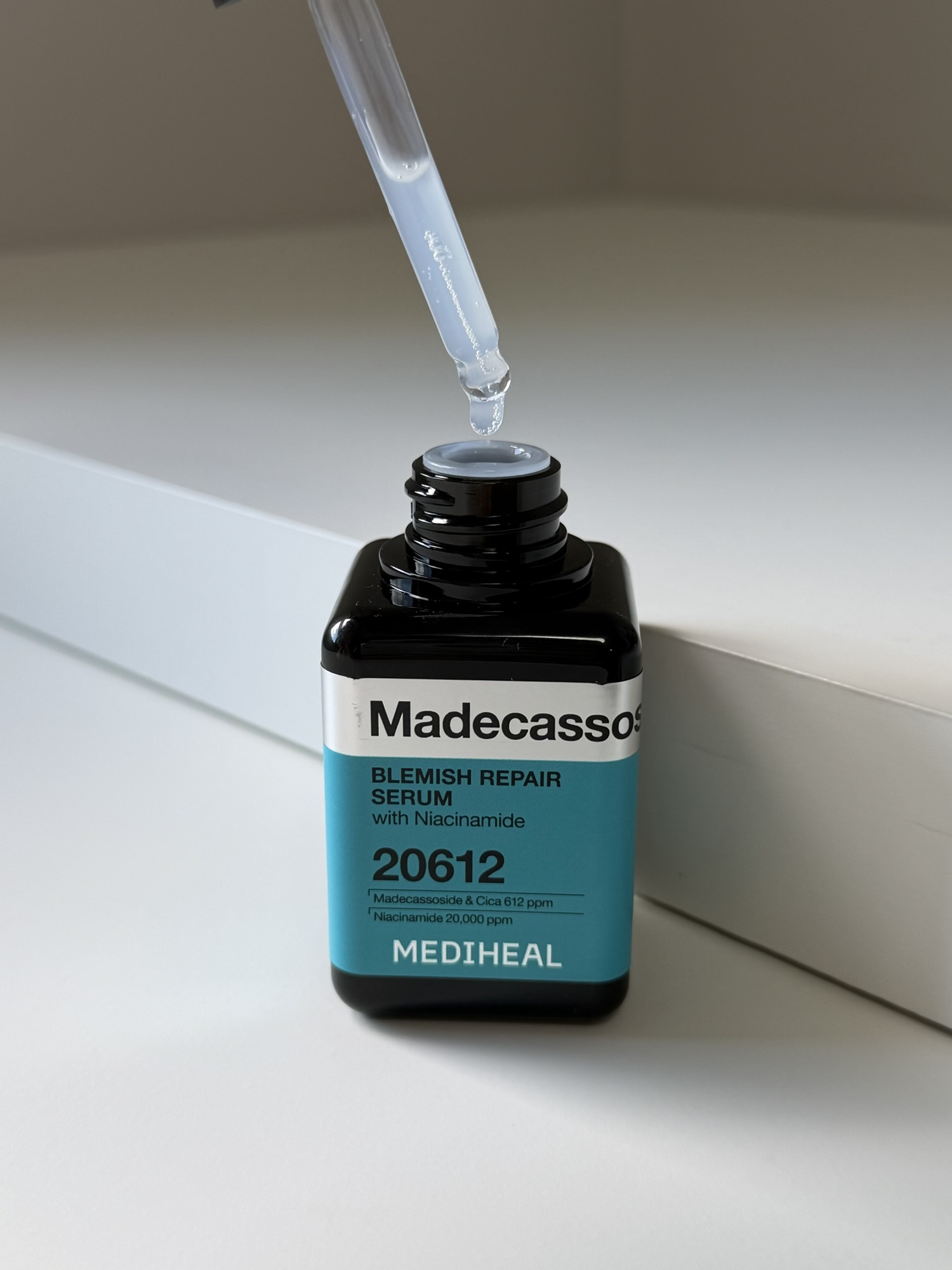 Mediheal Madecassoside serum dropper showing clear lightweight serum texture