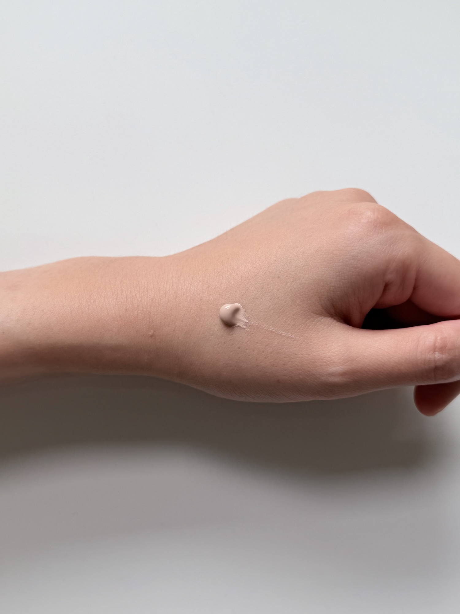 Small amount of Goodal Sun BB cream squeezed onto the back of a hand
