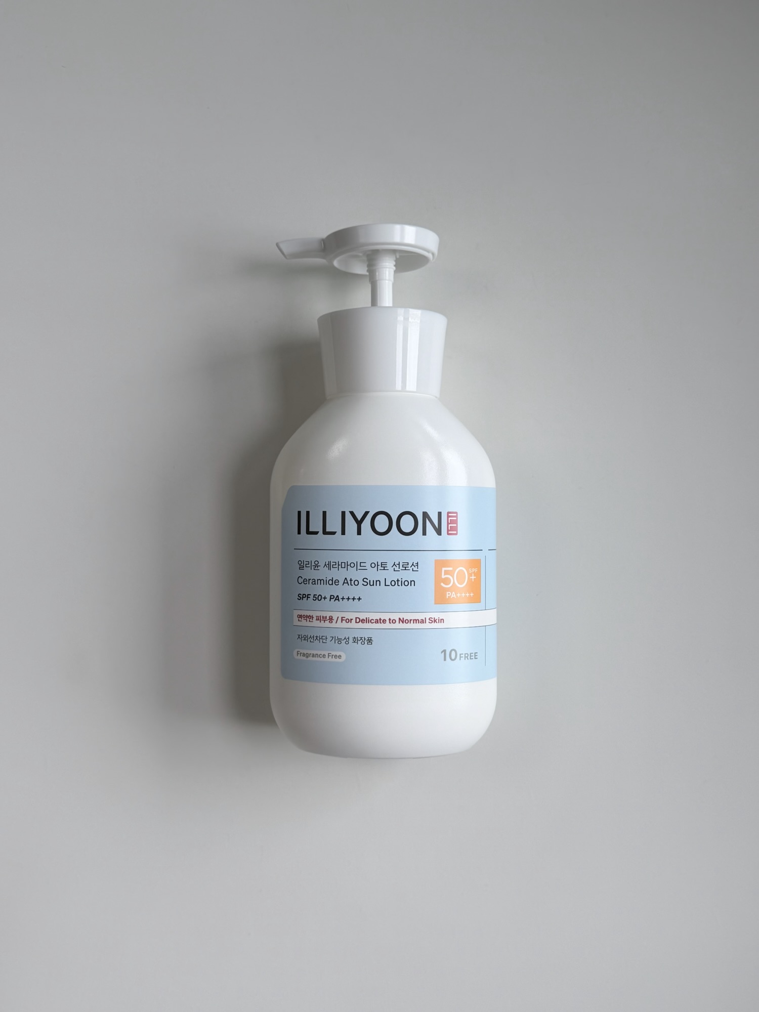 ILLIYOON Ceramide Ato Sun Lotion pump bottle with front label