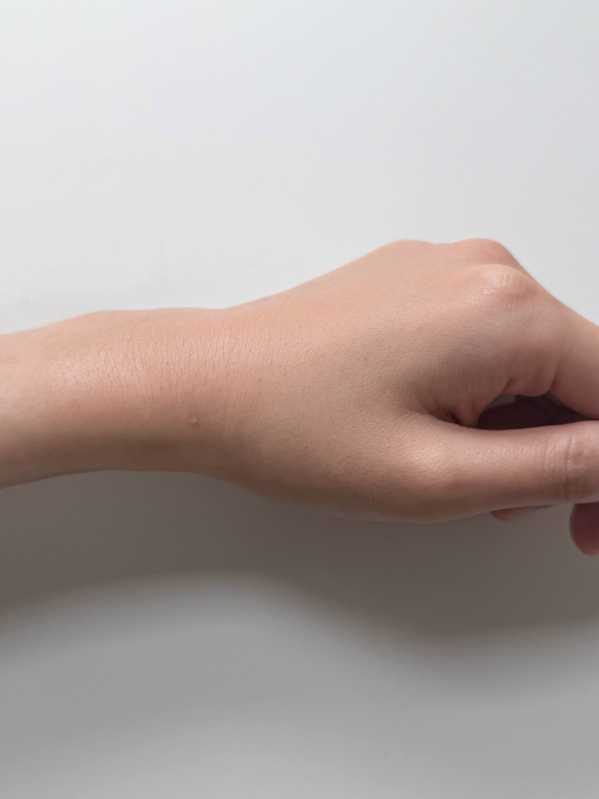 Back of a hand after Aestura Atobarrier 365 Hydro Soothing Cream has absorbed with a fresh glow