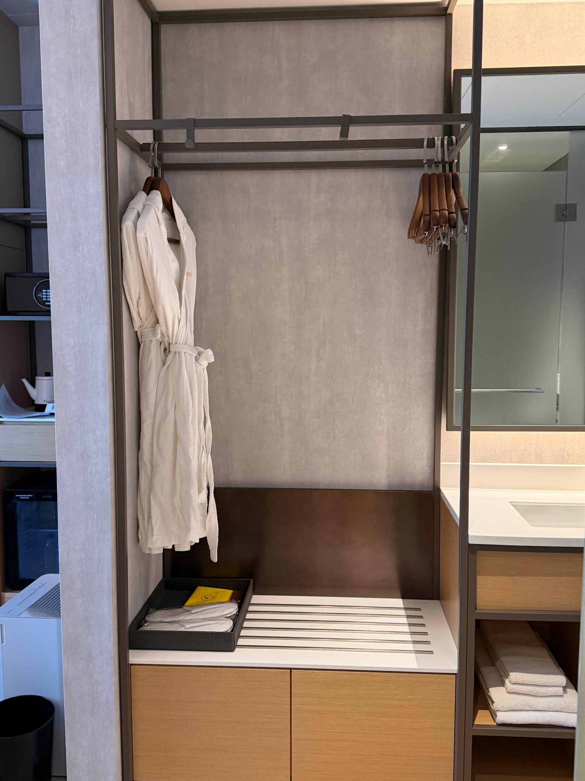 Sink and storage area in L7 Haeundae room bathroom