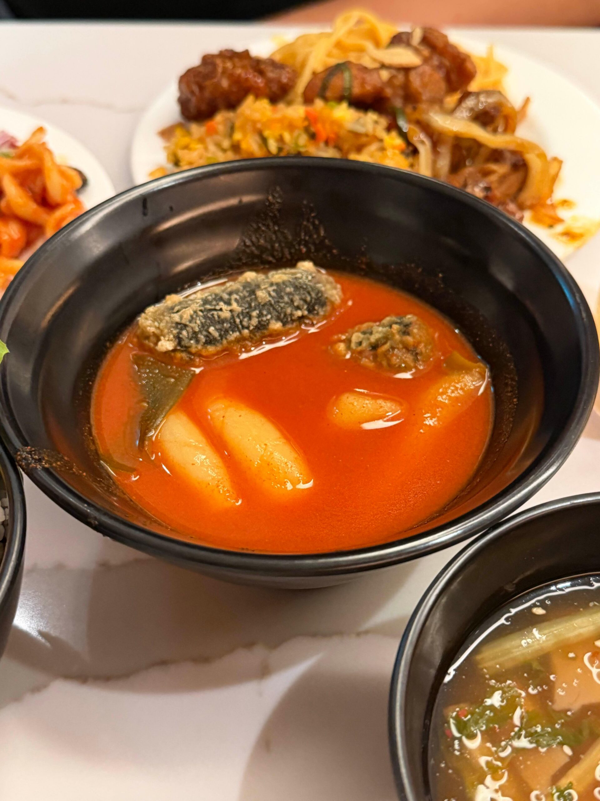 Tteokbokki and fried seaweed roll at Matina Lounge East
