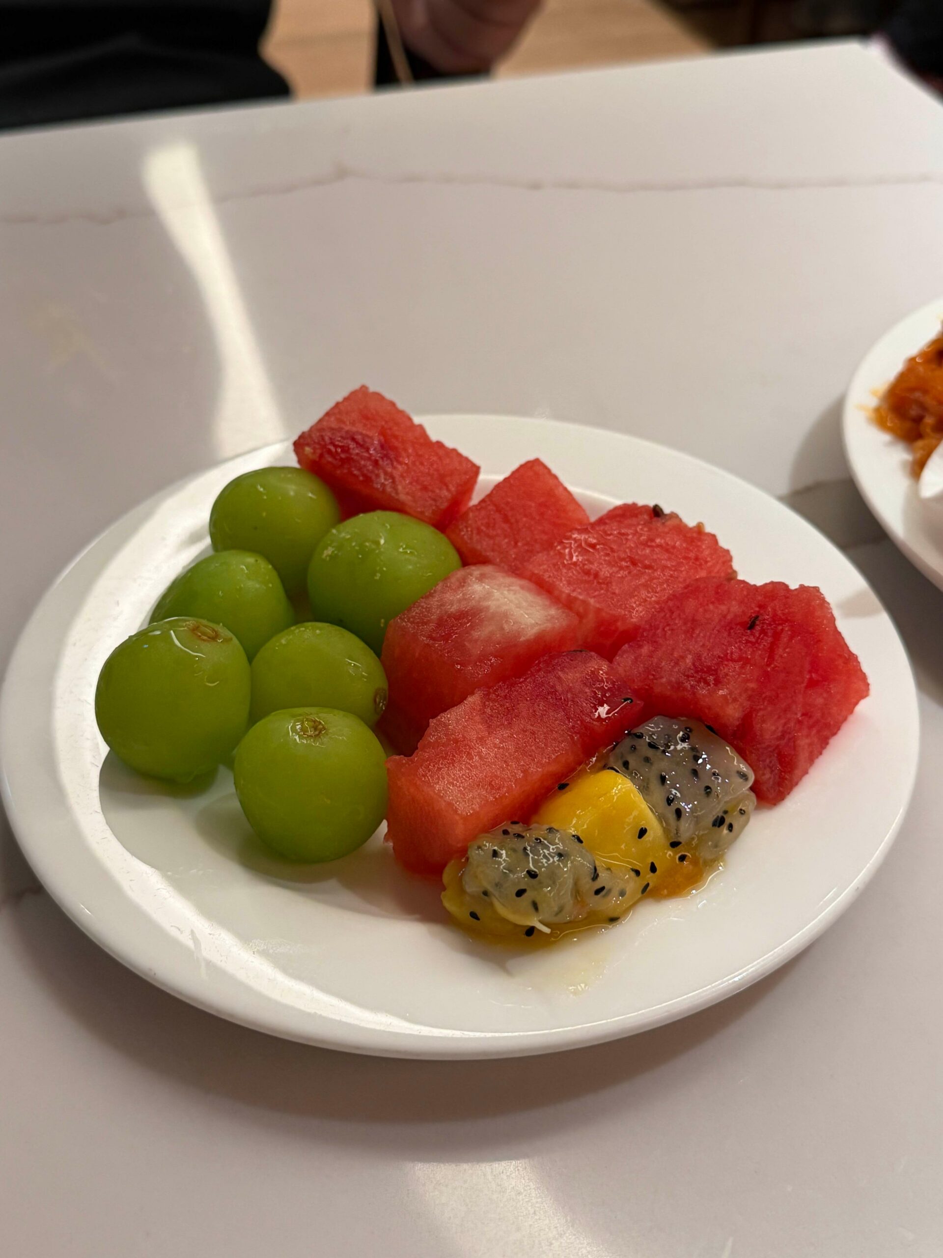 Fruit plate with watermelon and shine muscat at Matina Lounge East