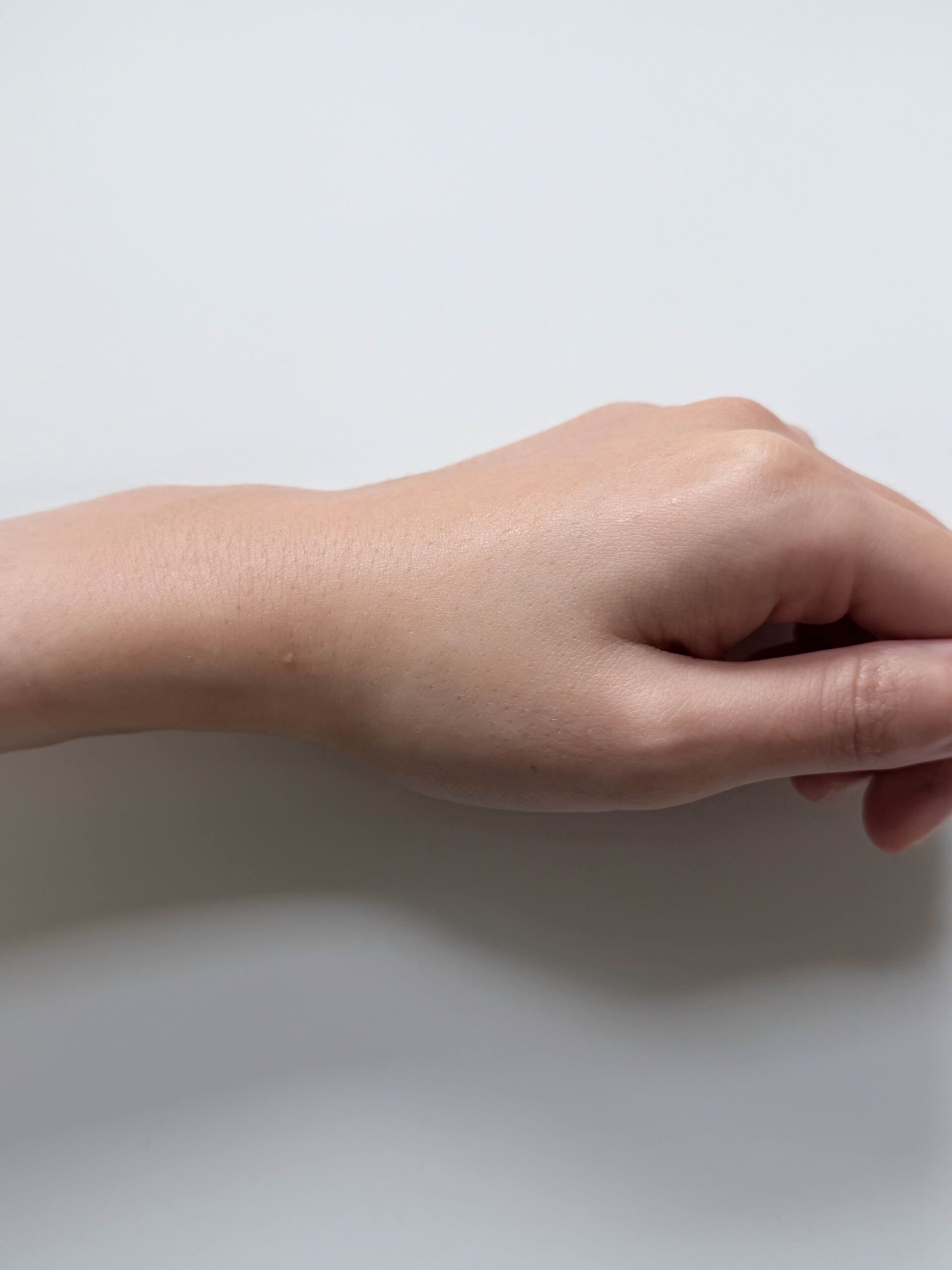 Back of hand after Round Lab 1025 Dokdo Toner has absorbed with a light hydrated finish