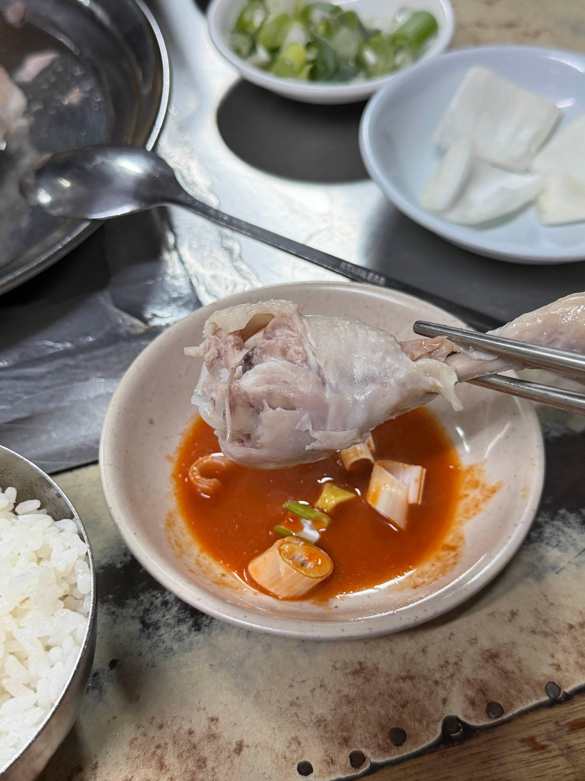 Tender chicken dipped in house sauce at Sarangbang Kalguksu