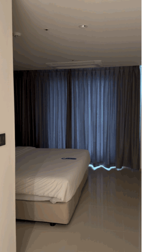 Curtains opening automatically in a Chestertons Gyeongju Standard Double room
