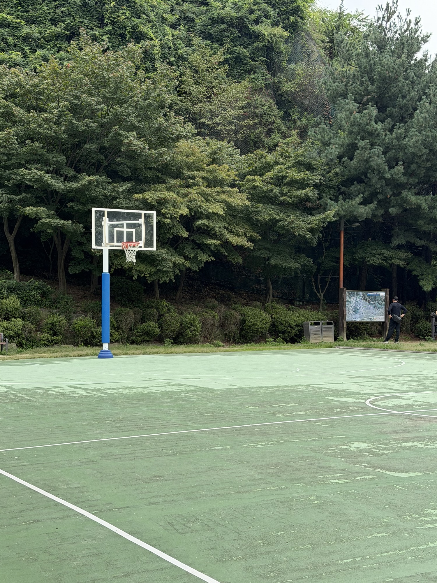 Basketball court and outdoor exercise area near the Yongmasan trail