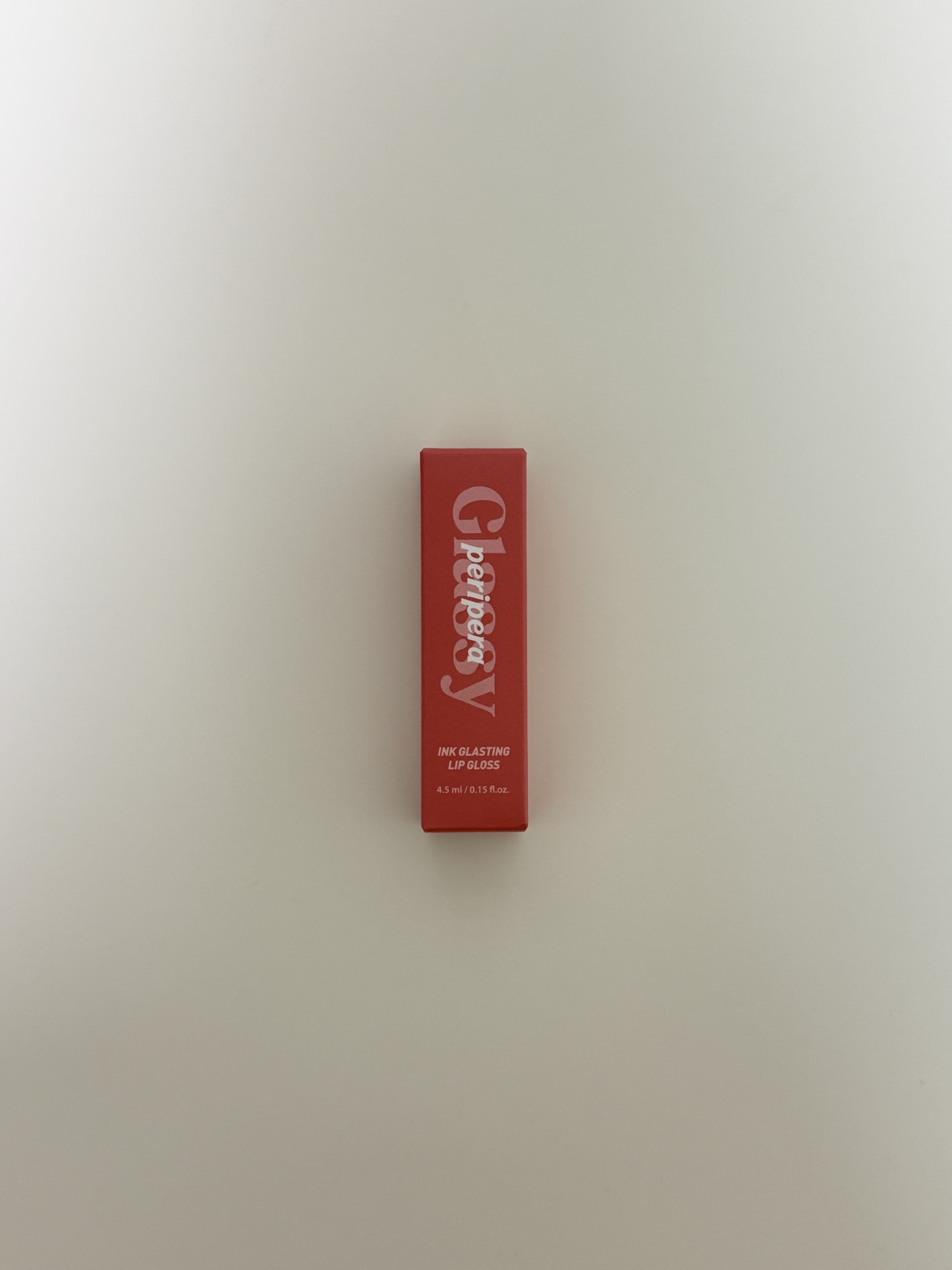 Peripera Ink Glasting Lip Gloss packaging with product description