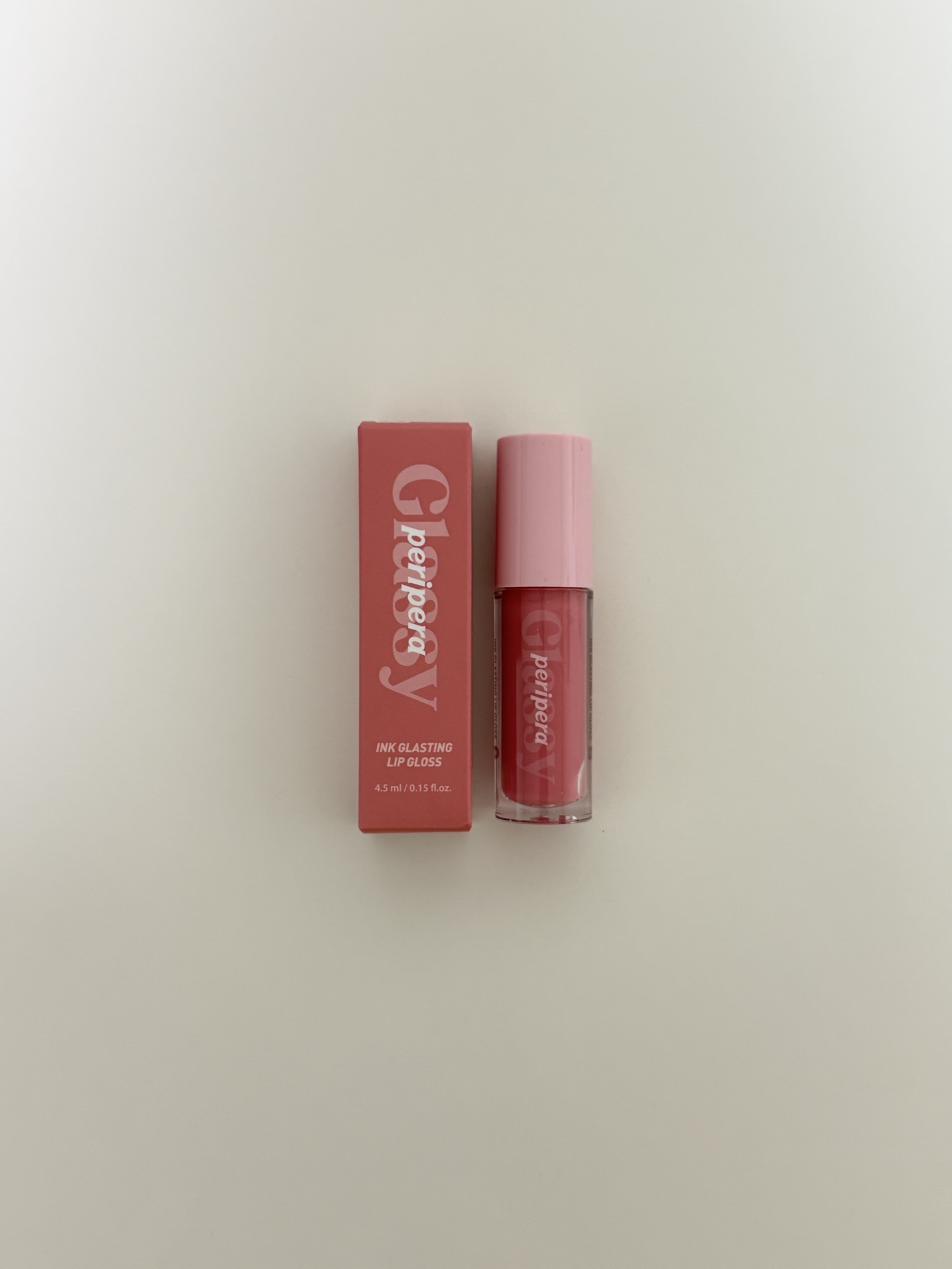 Peripera Ink Glasting Lip Gloss box showing moisturizing oil ingredients