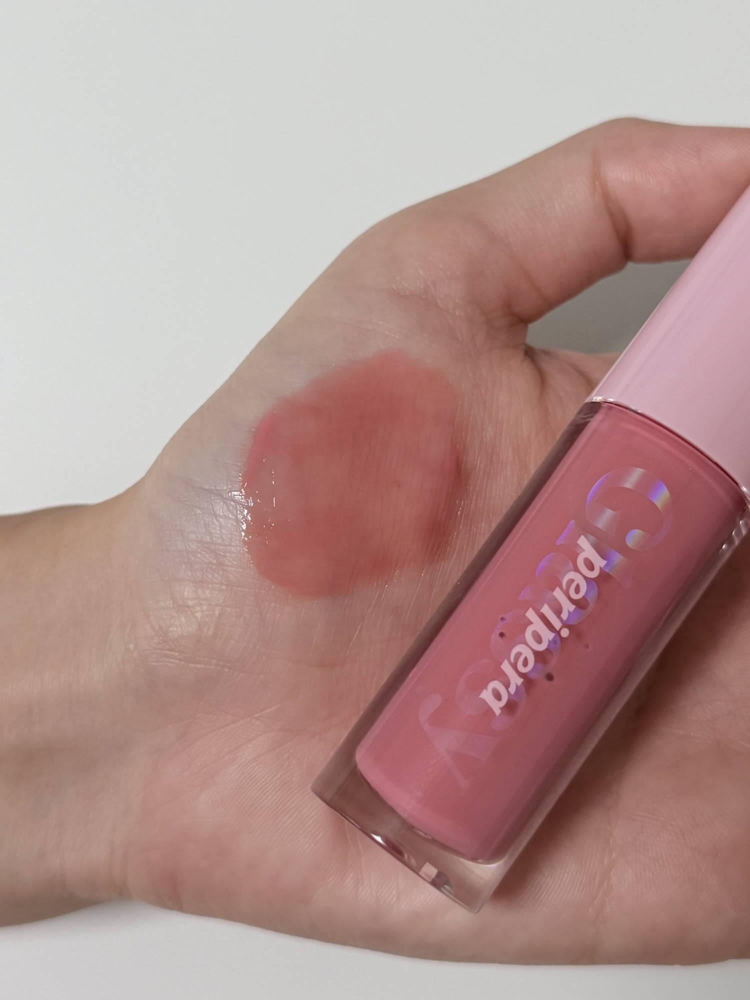 Peripera Ink Glasting Lip Gloss layered over a matte lip color