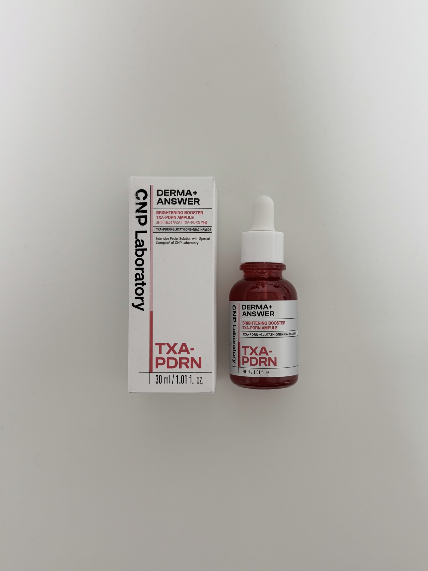 CNP TXA-PDRN Ampule bottle and box showing TXA and PDRN ingredients