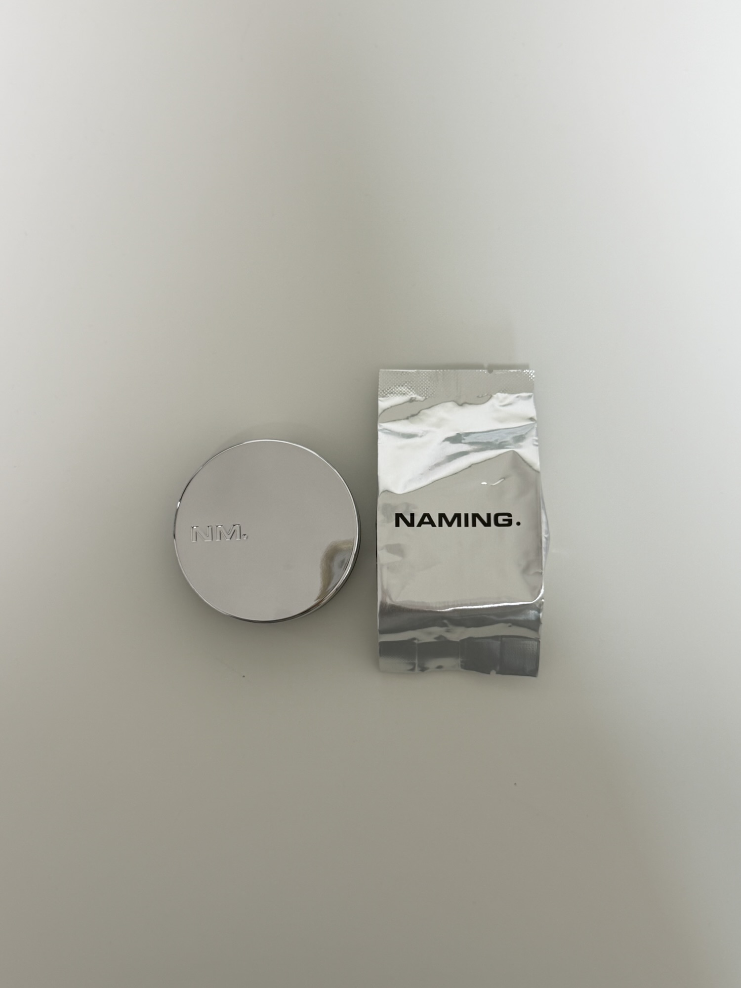 NAMING Layered Fit Cushion compact with refill pouch