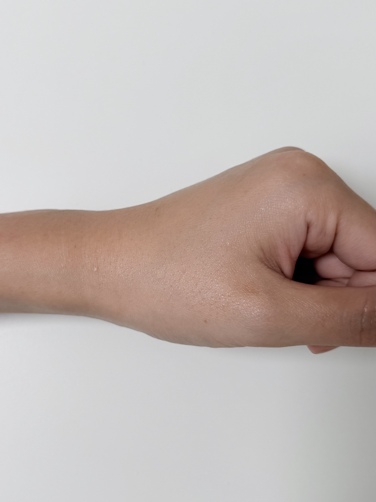 Goodal cream absorbed with a thin dewy finish on skin