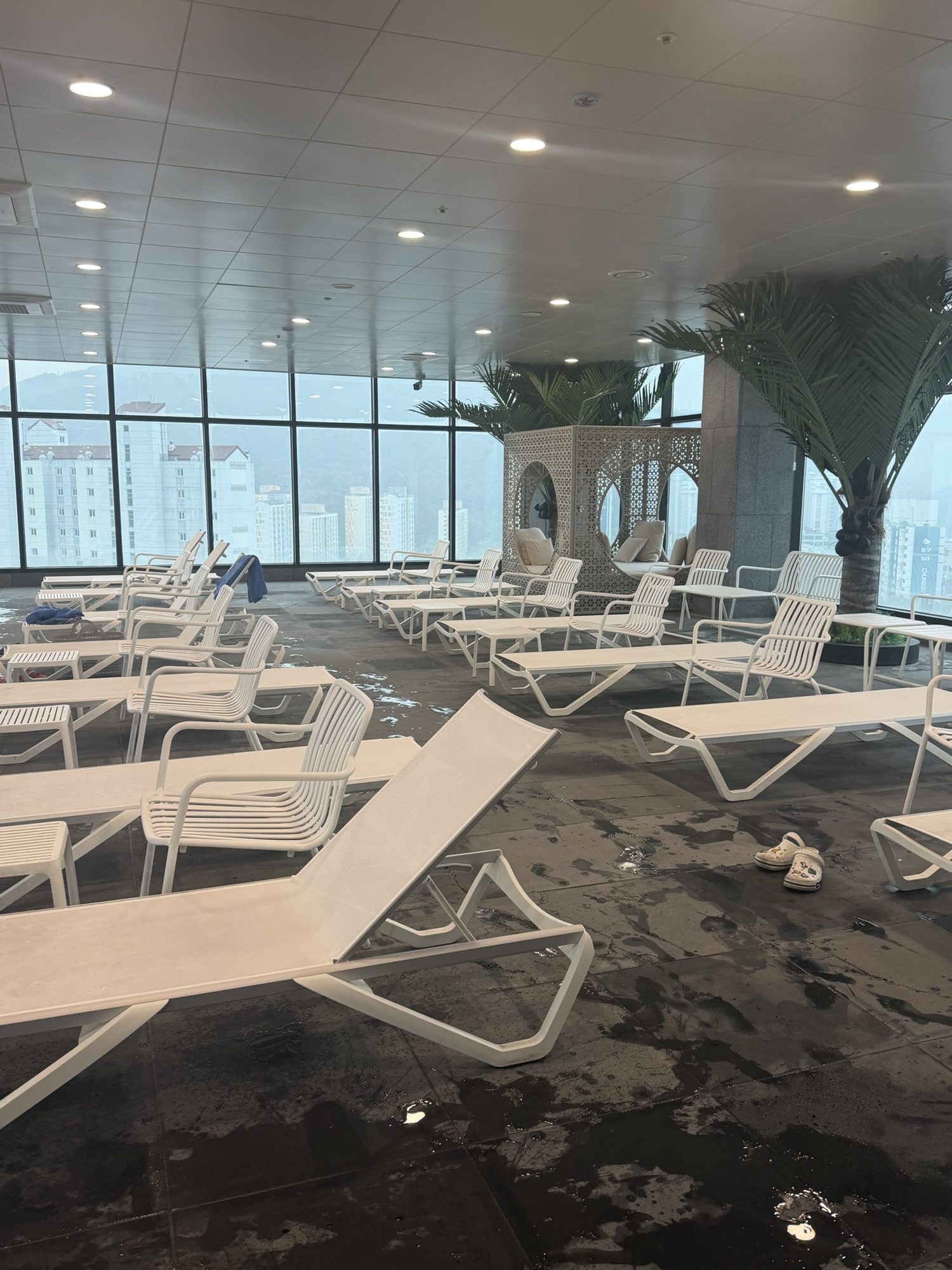 Indoor poolside lounge chairs at Chestertons Gyeongju