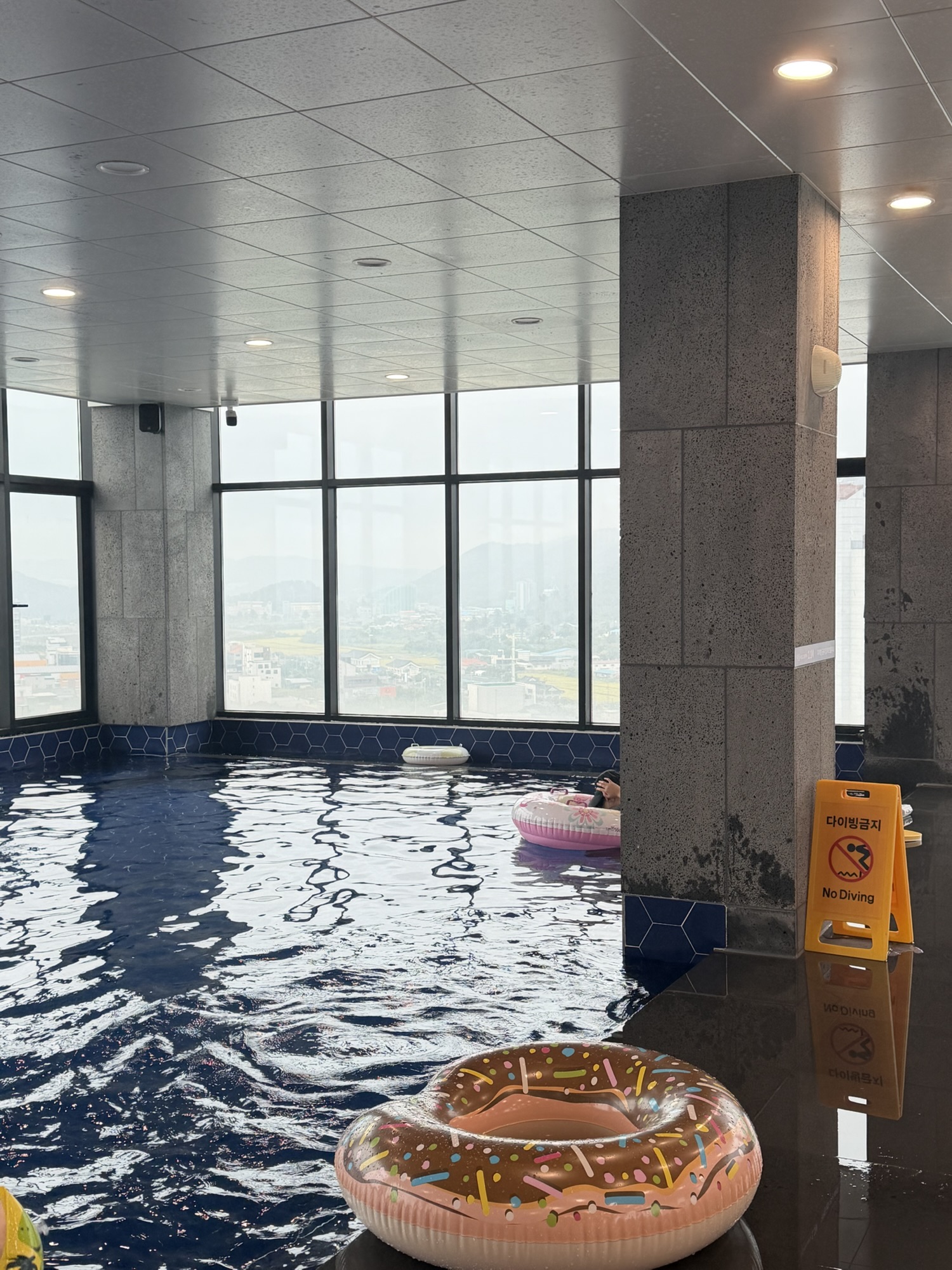 Indoor pool at Chestertons Gyeongju overlooking the city
