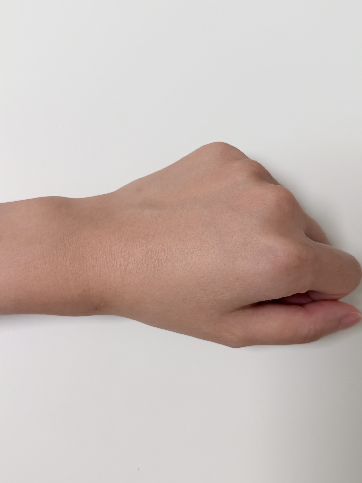 Hand after Needly Daily Toner Pad essence absorbs